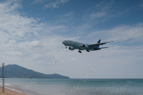 Airplane is landing at Thailand May Khao airport