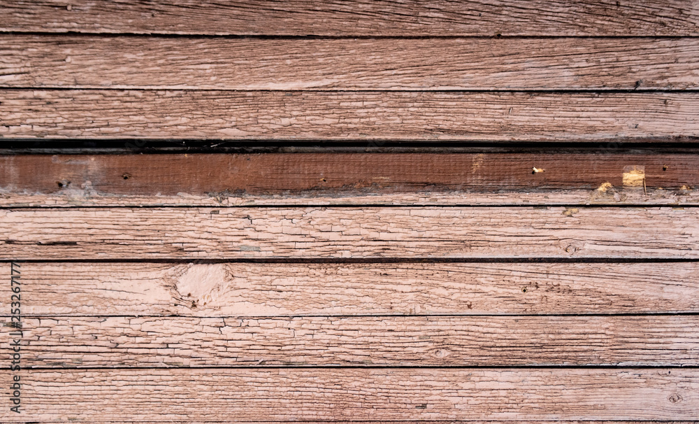 The texture of the old wooden fence painted board, the background floor. The texture of the old wooden fence painted board, the background floor.