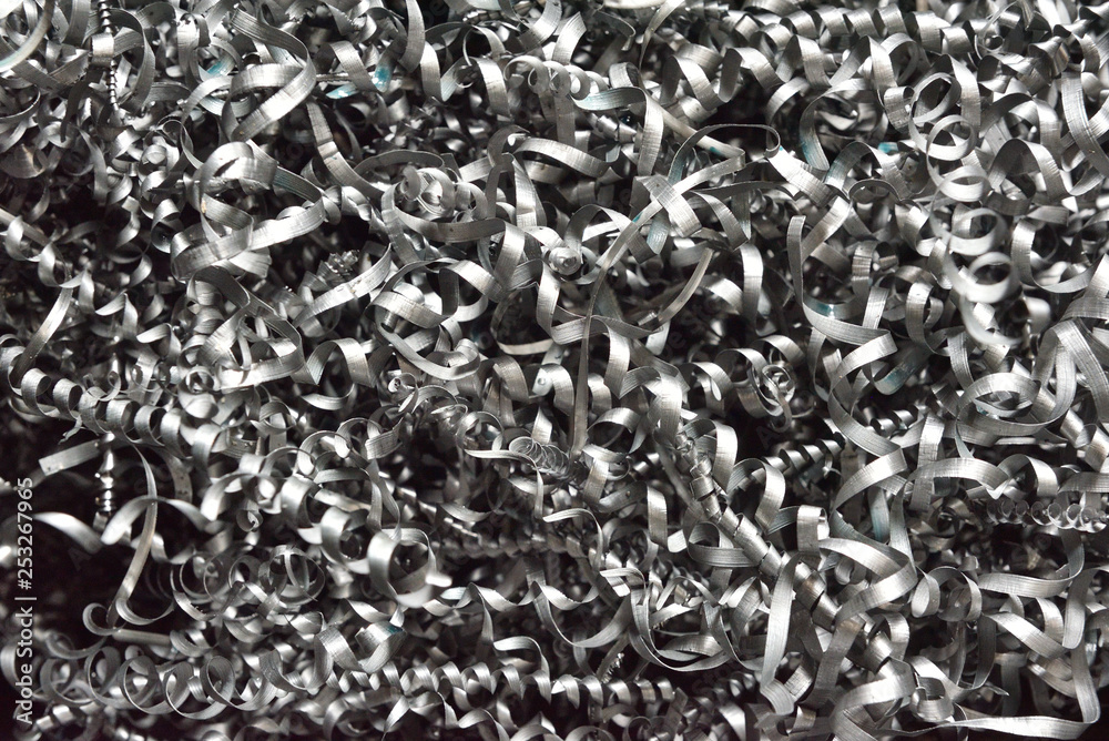 A lot of metal shavings after working on a milling machine or CNC machine. Metal shavings texture A lot of metal shavings after working on a milling machine or CNC machine. Metal shavings texture