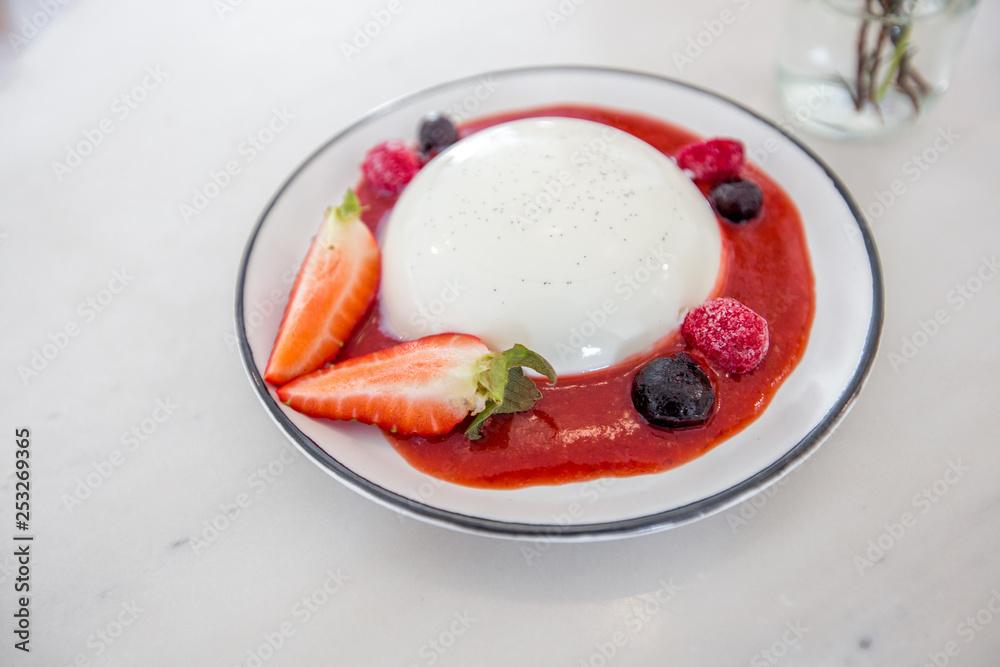 The food background is a dessert in a coffee shop, bakery shop, which consists of strawberries, milk bubbles, butter, as an alternative menu for health-loving customers and has a small amount of sugar The food background is a dessert in a coffee shop, bakery shop, which consists of strawberries, milk bubbles, butter, as an alternative menu for health-loving customers and has a small amount of sugar