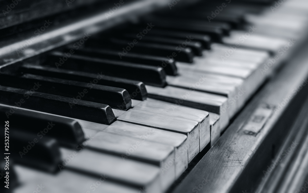 Old piano keyboard close up