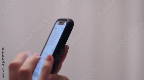 Wallpaper Mural female fingers are typing a message on a mobile device. social networks for communication. instant messengers for quick communication Torontodigital.ca