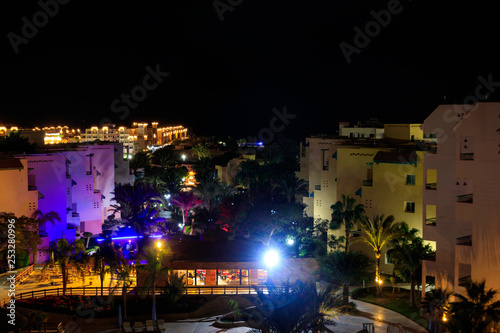 Night view of the modern tropical resort in Hurghada, Egypt. View from above © olyasolodenko