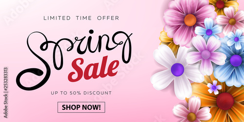 Spring Sale advertising text banner design with realistic flowers and handwrited lettering on bright floral background for season ads