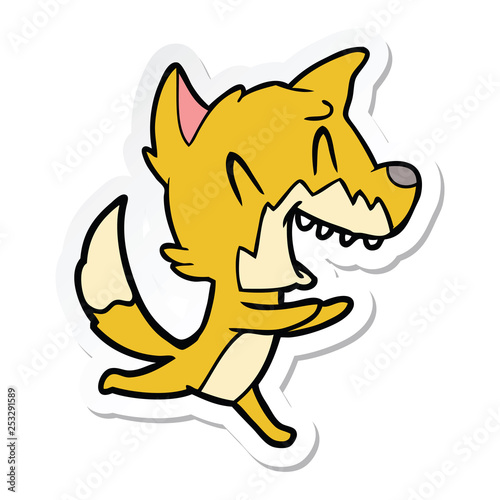 sticker of a laughing fox running away