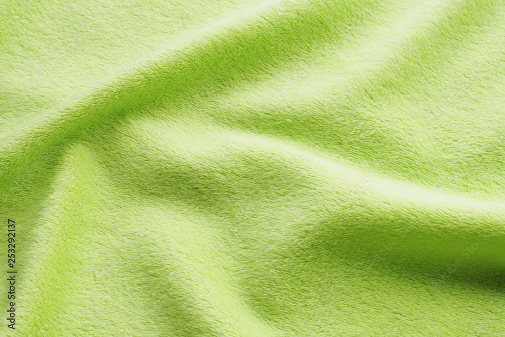 Fototapeta premium background light green plush with folds..