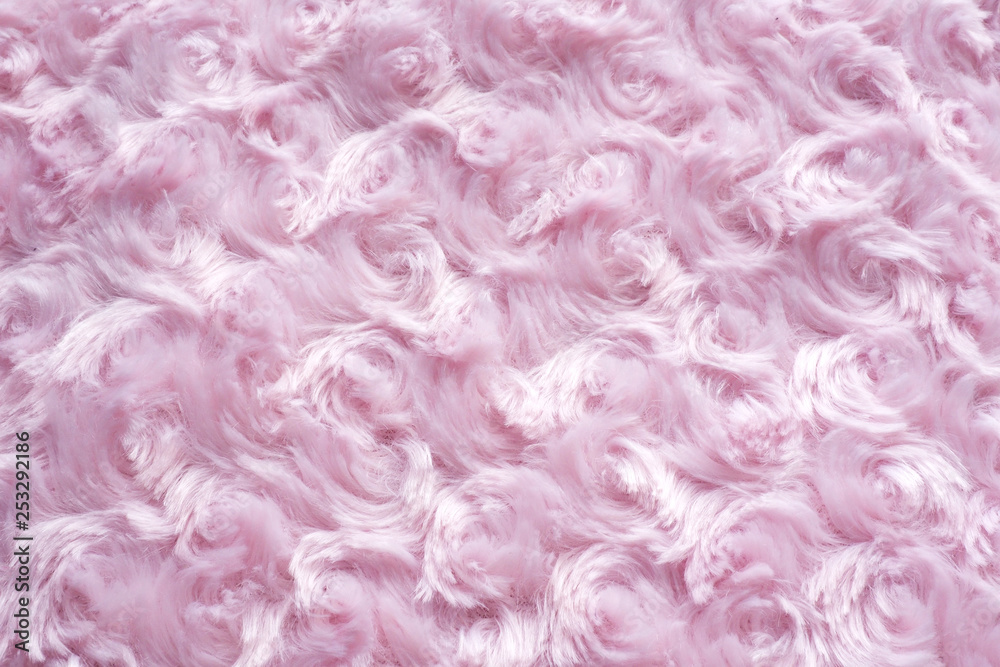 Fototapeta premium .background of pink faux fur with curls..
