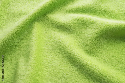 background light green plush with folds..