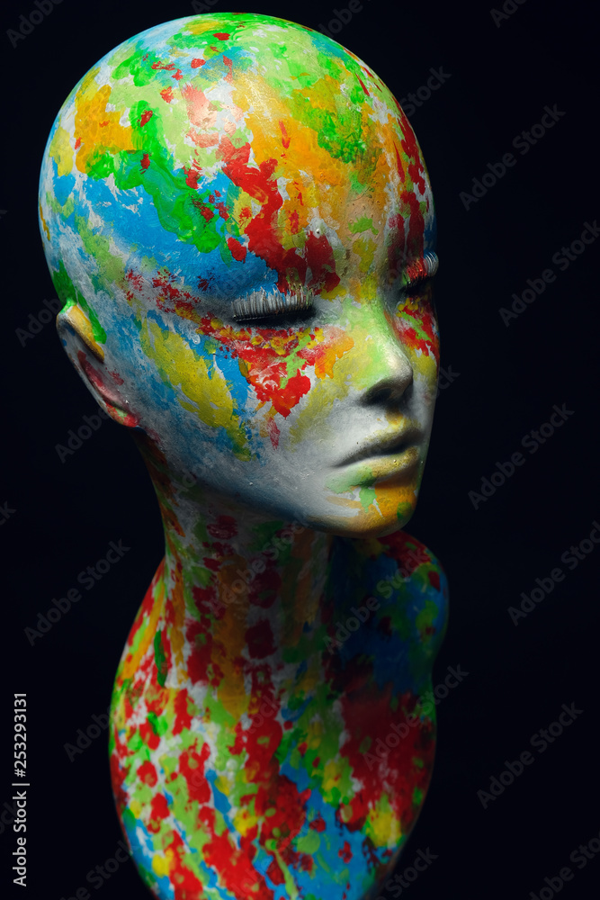 Closeup studio shot of colored woman mannequin with stylish decoration