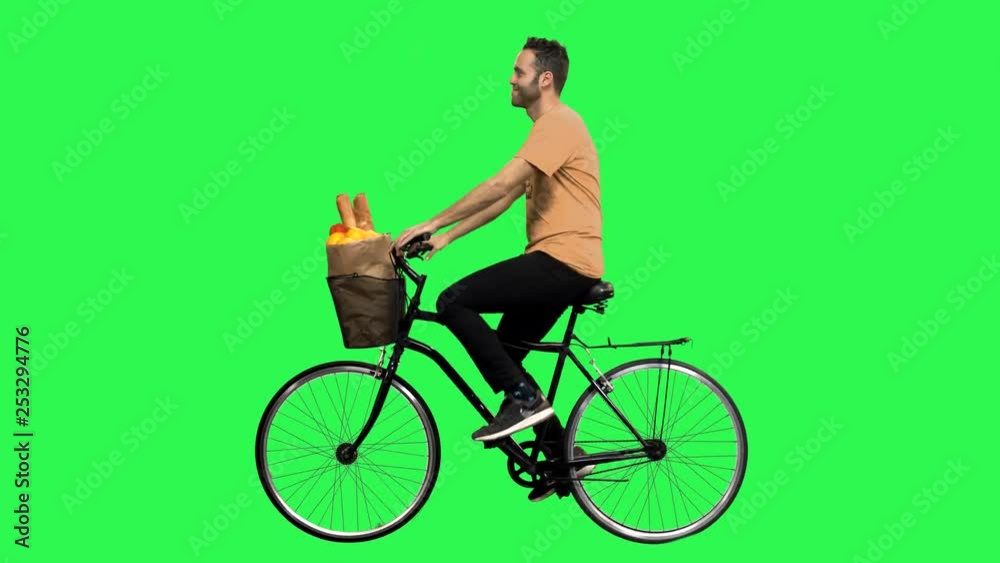 Reactions to the camera by a man riding a bicycle over a green screen. No motion blur for optimal keying. Reactions to the camera by a man riding a bicycle over a green screen. No motion blur for optimal keying.