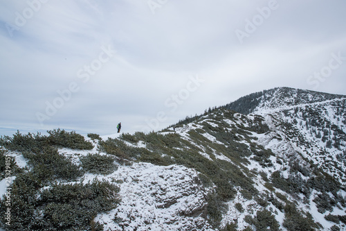 Fototapeta Naklejka Na Ścianę i Meble -  Mountain peaks in Zakopane and in Poland covered with fresh snow in the daytime with blue sky