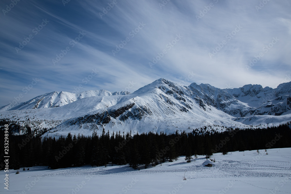 Mountain peaks in Zakopane and in Poland cover with fresh snow during a sunny day