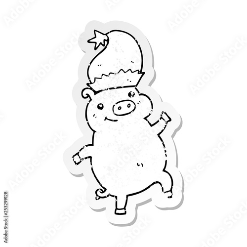 distressed sticker of a cartoon happy christmas pig
