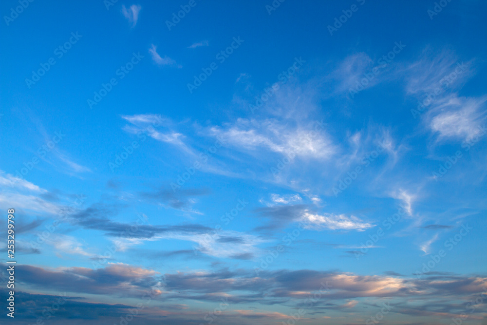 Background of beautiful sky with clouds. Looking up view. Abstract natural sky background.Close Up. Background of beautiful sky with clouds. Looking up view. Abstract natural sky background.Close Up.
