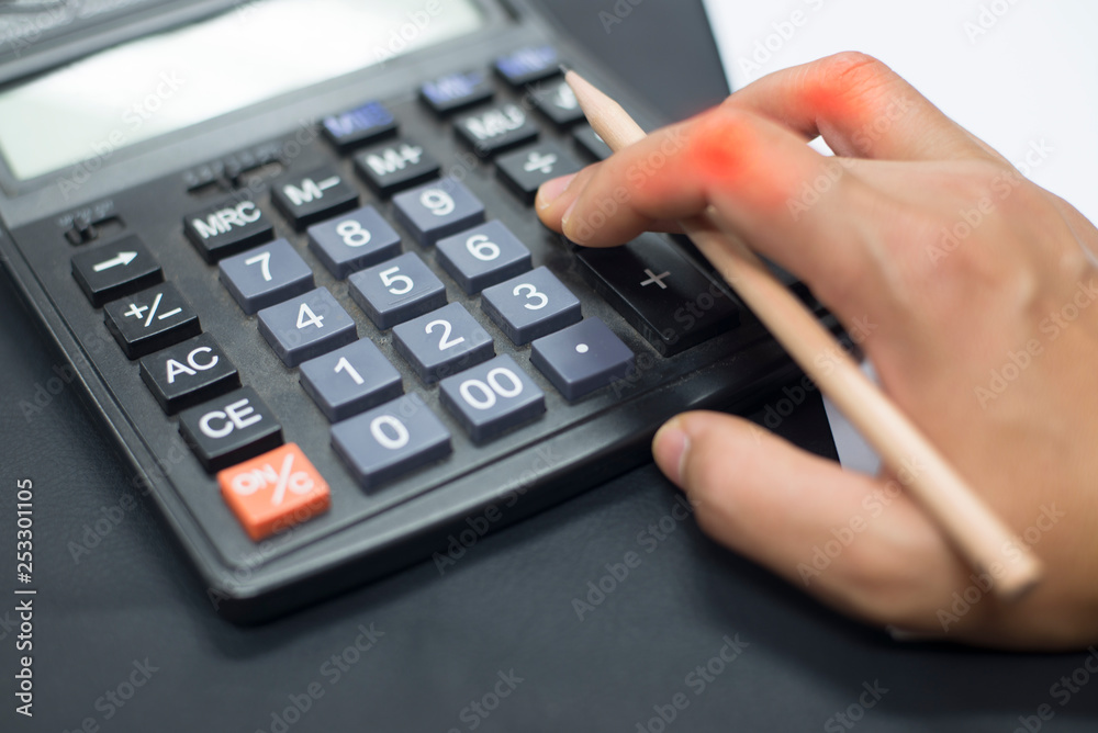 Trigger finger with calculator. Trigger finger with calculator.