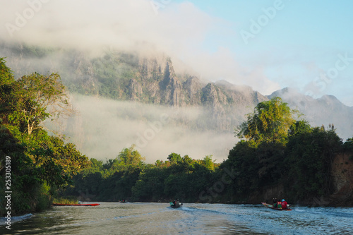 Boats rowing along Nam Song river