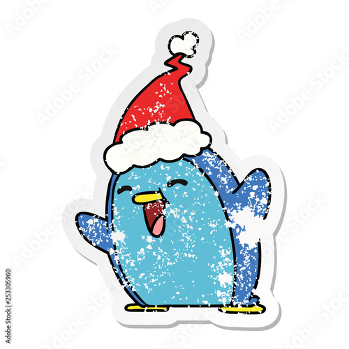 christmas distressed sticker cartoon of kawaii penguin