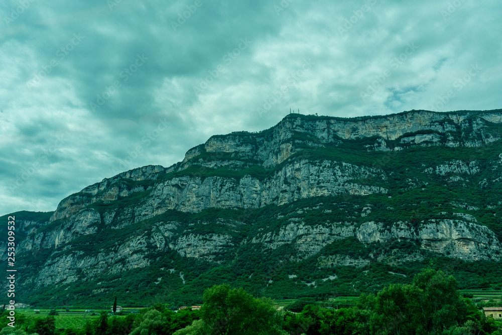 Italy,La Spezia to Kasltelruth train, a large mountain in the background Italy,La Spezia to Kasltelruth train, a large mountain in the background