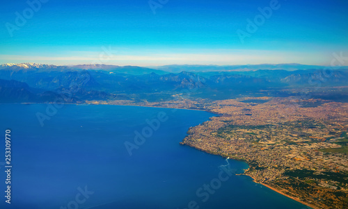 Blurred Antalya bay in Turkey from airplane windows