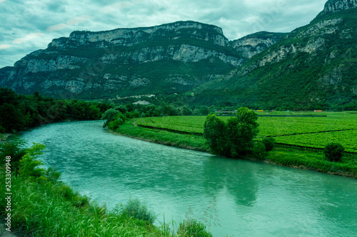 Italy,La Spezia to Kasltelruth train, a body of water with a mountain in the background