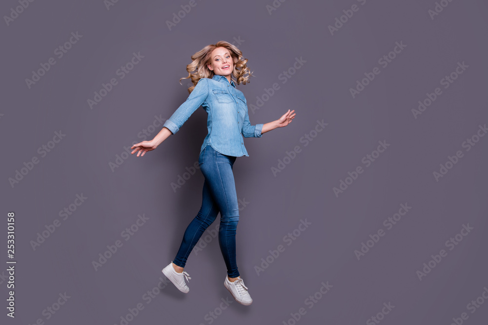 Full length body size profile side view portrait of her she nice cute charming lovely attractive carefree cheerful wavy-haired lady having fun isolated over gray purple violet pastel background