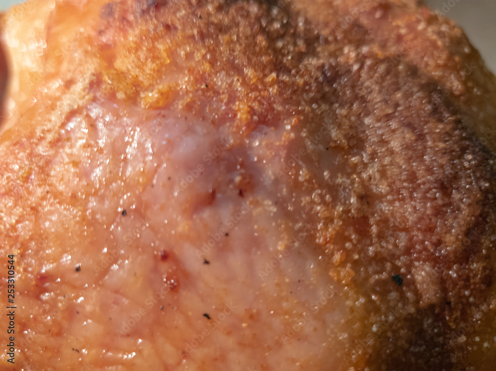 The man turns a fried chicken in a pan on a hotplate.Cooking Fried Chicken The man turns a fried chicken in a pan on a hotplate.Cooking Fried Chicken