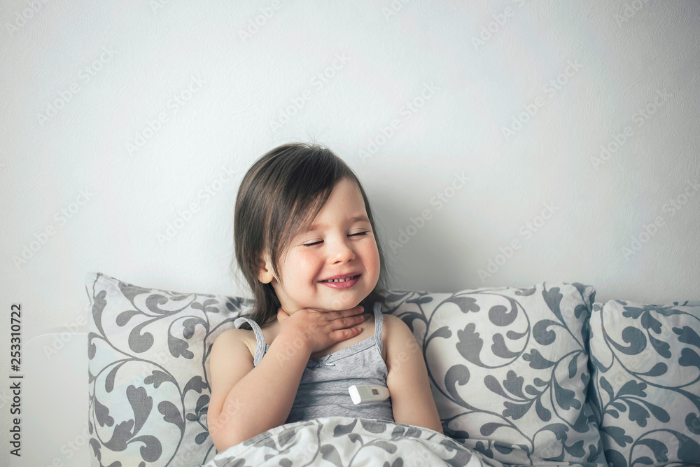 The little girl caught a cold. The girl lies in bed and is ill. The child has a runny nose and cough. The little girl caught a cold. The girl lies in bed and is ill. The child has a runny nose and cough.