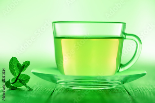 A cup of green tea with mint