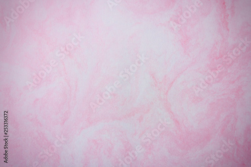 ピンクのマーブリングのある背景紙