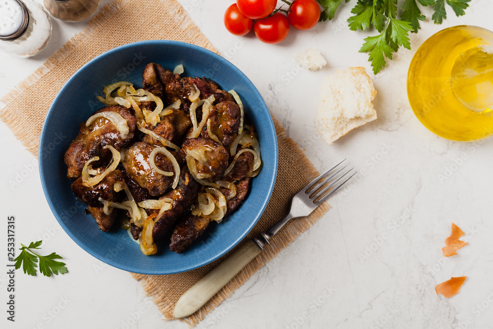 Fried chicken liver with onions.