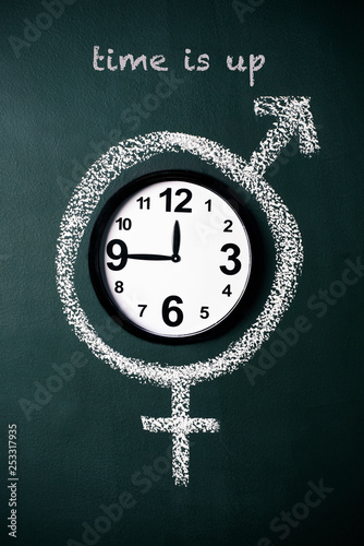 text time is up and symbol for gender equality photo