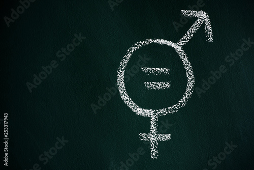 symbol for gender equality on a chalkboard photo