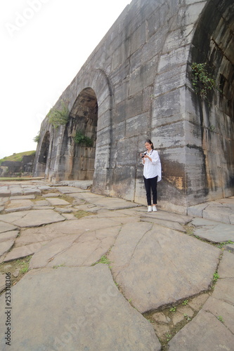 woman traveling to Ho citadel in Thanh Hoa,Vietnam