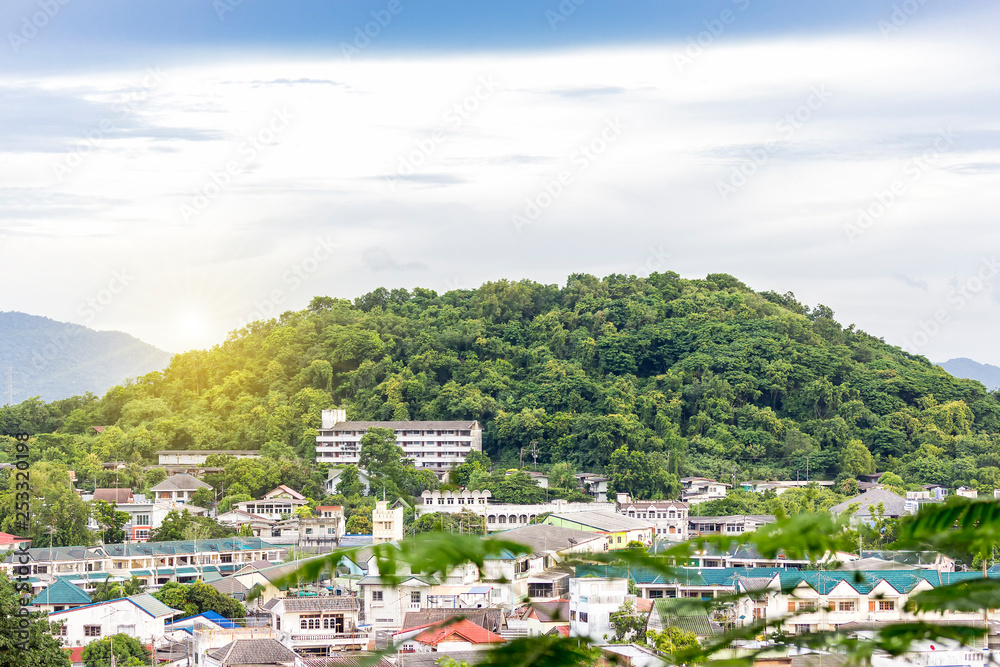 Beautiful view of town or village at foothills in chonburi city of thailand taken from hill in evening Beautiful view of town or village at foothills in chonburi city of thailand taken from hill in evening