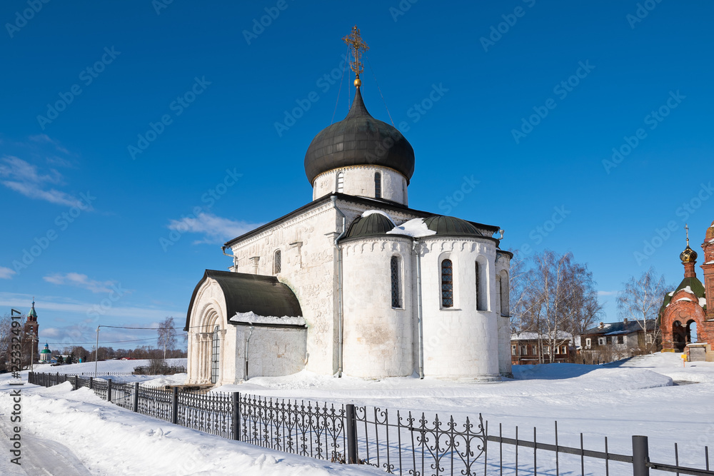 View of the white-stone Saint George Cathedral facade in winter, Yuryev-Polsky, Russia View of the white-stone Saint George Cathedral facade in winter, Yuryev-Polsky, Russia