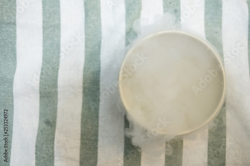 Dry ice smoke or liquid nitrogen in bowl