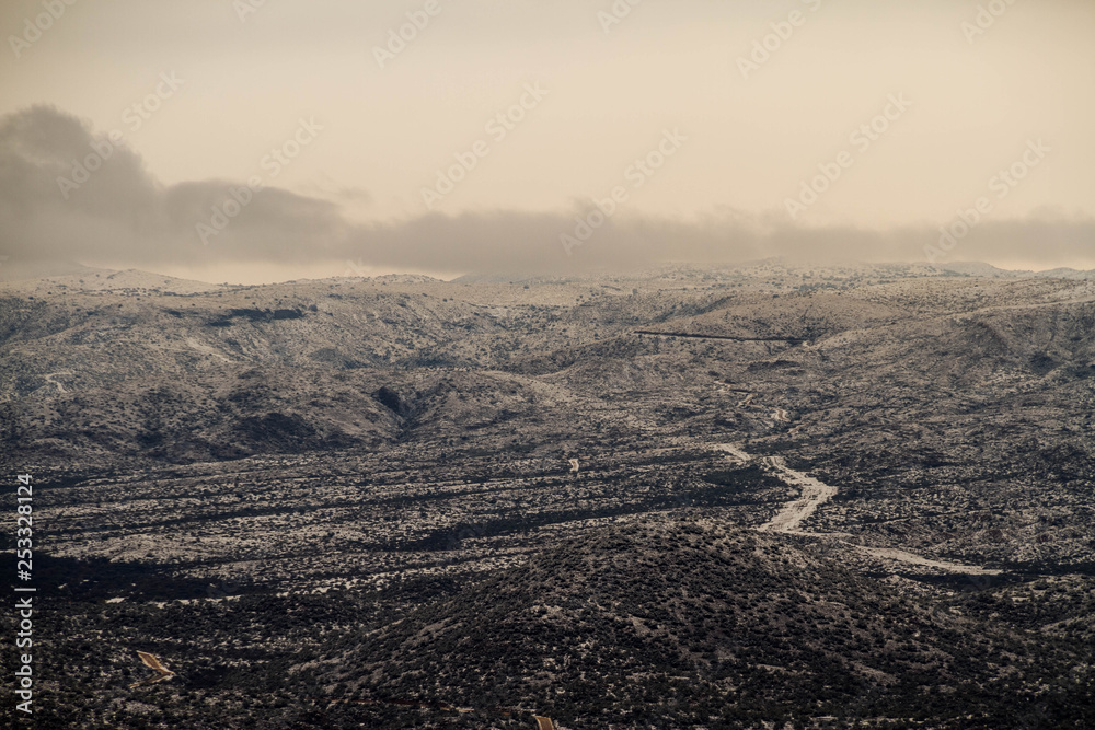 Mountains of Arizona covered in snow in a panoramic image. Mountains of Arizona covered in snow in a panoramic image.
