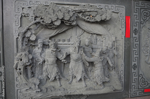 Decorative stone carving on the wall at Sun Moon Lake Wen Wu Temple