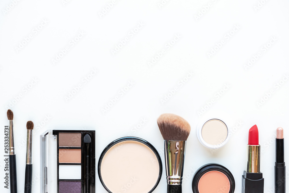 Makeup cosmetics tools background and beauty cosmetics, products and facial cosmetics package lipstick, eye shadow on the white background. Lifestyle Fashion Concept - obrazy, fototapety, plakaty 