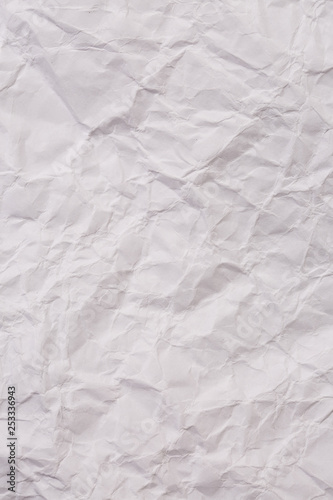 Paper crumple with the texture of the surface,White creased paper texture for abstract background..