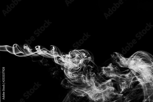 abstract Smoking white. Explosive powder white Smoke on black background.