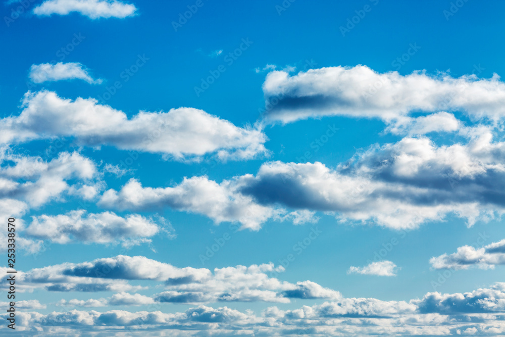 Bright turquoise sky with clouds, background Bright turquoise sky with clouds, background