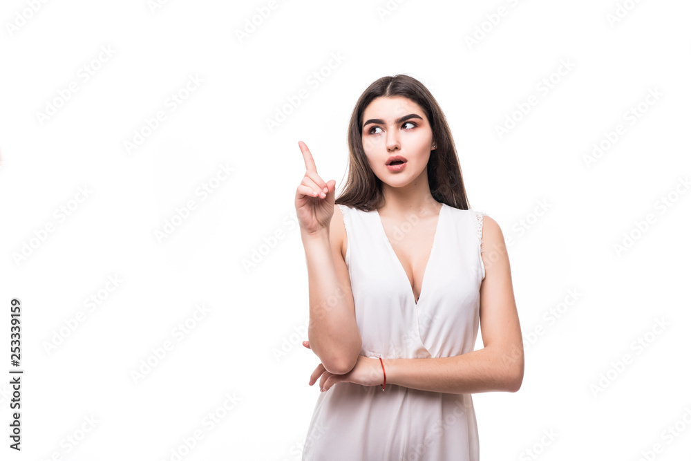 Portrait of young woman pointing her finger in eureka sign, having great innovative idea, understanding or solution she has just got isolated on white background Portrait of young woman pointing her finger in eureka sign, having great innovative idea, understanding or solution she has just got isolated on white background