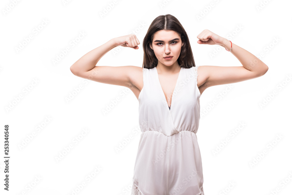 Young woman points to the strong hands on a white background Young woman points to the strong hands on a white background