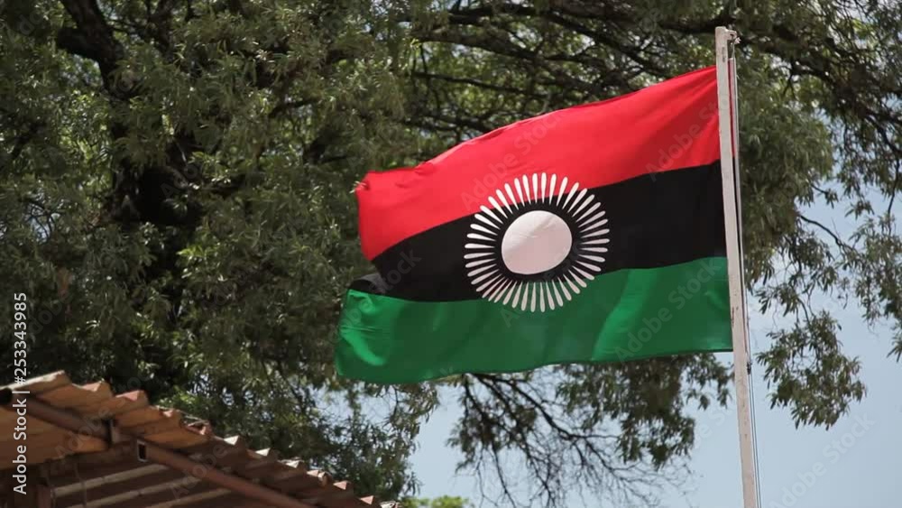 Malawi flag blowing in wind
