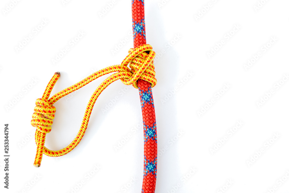 Klemheist or French Machard friction hitch knot, isolated on white background, with discreet