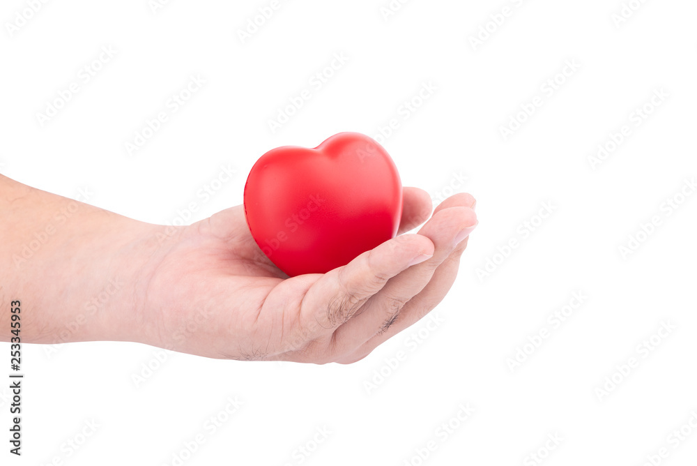 Concept of love for valentine day or Healthcare : Man's hand holding a red heart for give to someone isolated on white background Concept of love for valentine day or Healthcare : Man's hand holding a red heart for give to someone isolated on white background