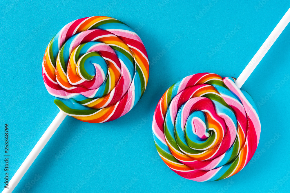 Colorful lollipops on blue background Colorful lollipops on blue background