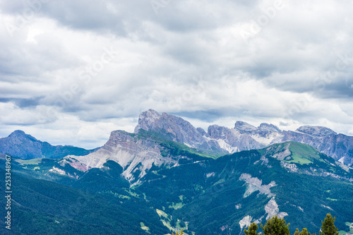 Wallpaper Mural Alpe di Siusi, Seiser Alm with Sassolungo Langkofel Dolomite, a view of a large mountain in the background Torontodigital.ca