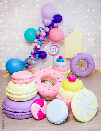 set of huge artificial sweets and pastry decorations
